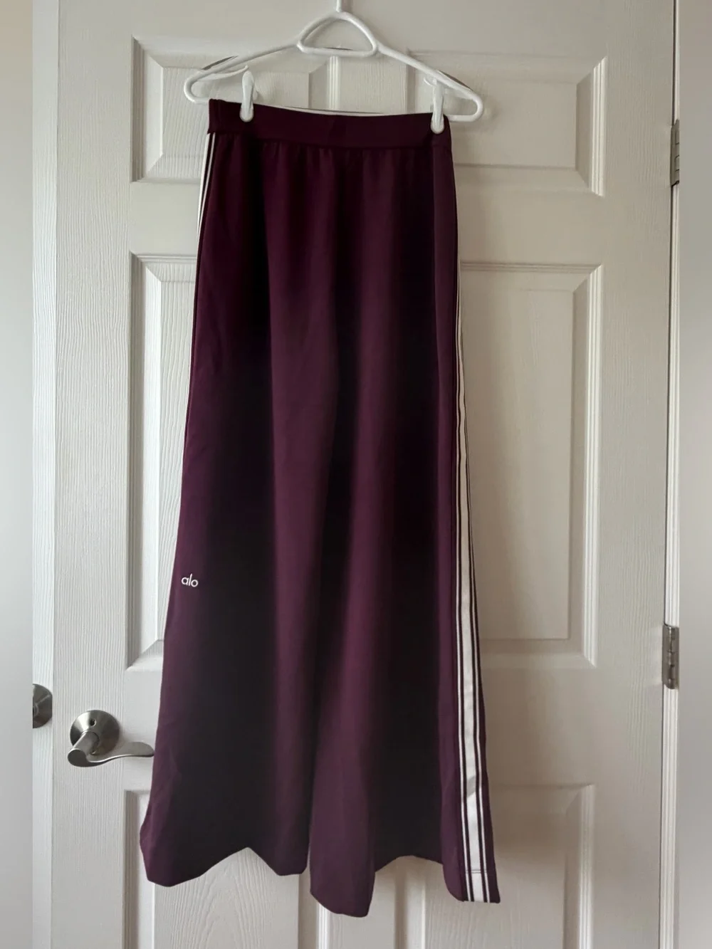 ALO Yoga Wide-Leg Track Pants in Plum with White Side Stripes - Picture 3 of 10